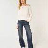 Jeans larghi a vita bassa con lavaggio scuro