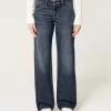 Jeans larghi a vita bassa con lavaggio scuro