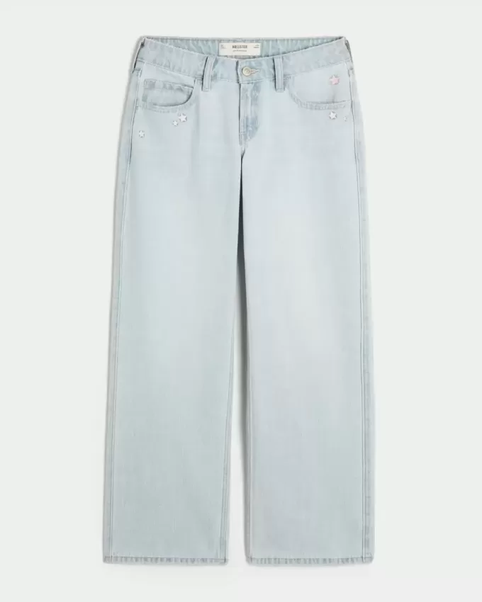 Jeans larghi a vita bassa con ricamo a stella e lavaggio chiaro