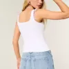 Jeans larghi a vita bassa con ricamo floreale e lavaggio medio