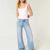 Jeans larghi a vita bassa con ricamo floreale e lavaggio medio