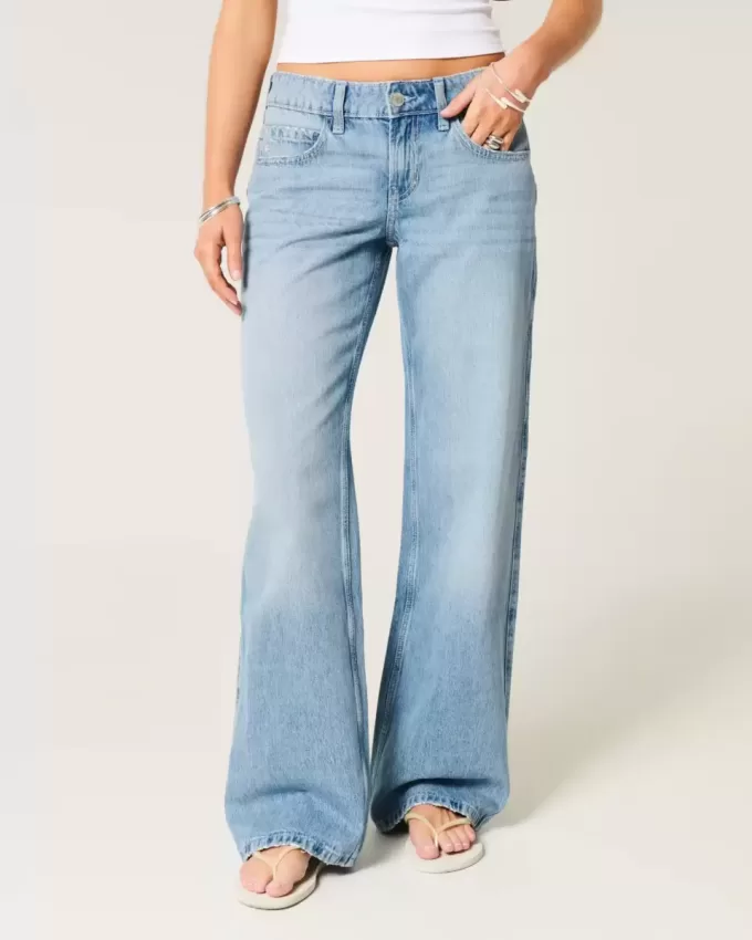 Jeans larghi a vita bassa con ricamo floreale e lavaggio medio