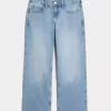 Jeans larghi a vita bassa con ricamo floreale e lavaggio medio
