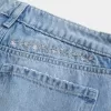 Jeans larghi a vita bassa con ricamo floreale e lavaggio medio