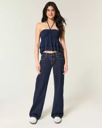 Jeans larghi a vita bassa con risvolto e lavaggio scuro