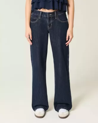 Jeans larghi a vita bassa con risvolto e lavaggio scuro