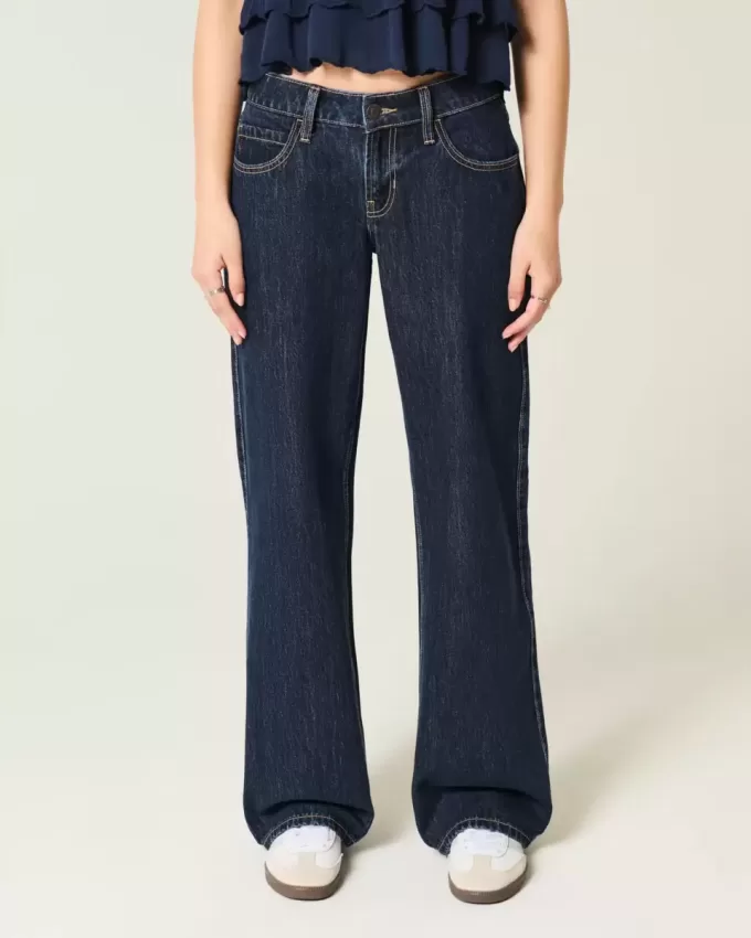 Jeans larghi a vita bassa con risvolto e lavaggio scuro