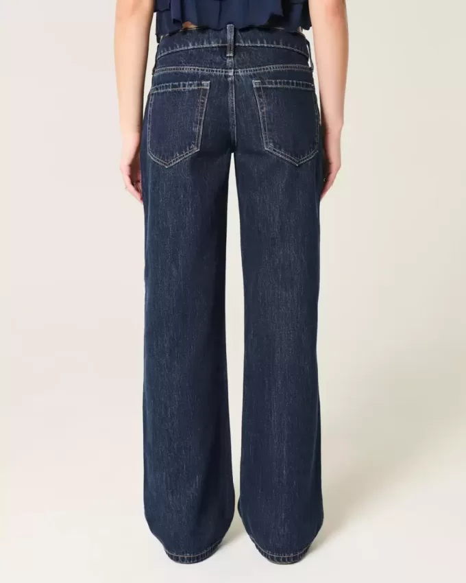 Jeans larghi a vita bassa con risvolto e lavaggio scuro