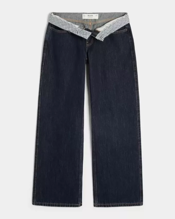 Jeans larghi a vita bassa con risvolto e lavaggio scuro