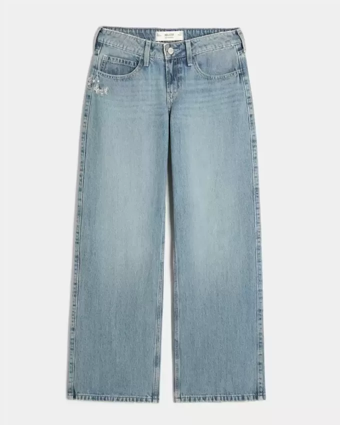Jeans larghi a vita bassa con stampa a farfalla e lavaggio medio