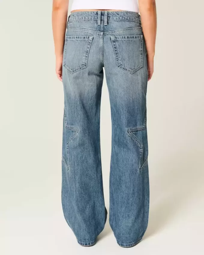 Jeans larghi a vita bassa con stampa a stelle e lavaggio medio