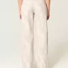 Jeans larghi a vita bassa con stampa Doe