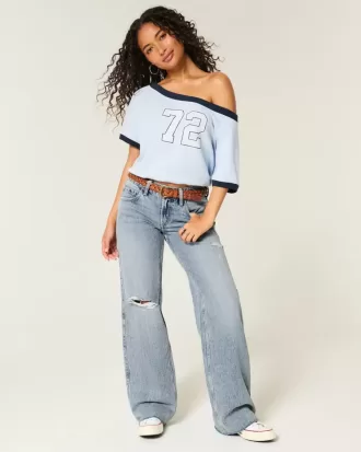 Jeans larghi a vita bassa con strappi e lavaggio chiaro