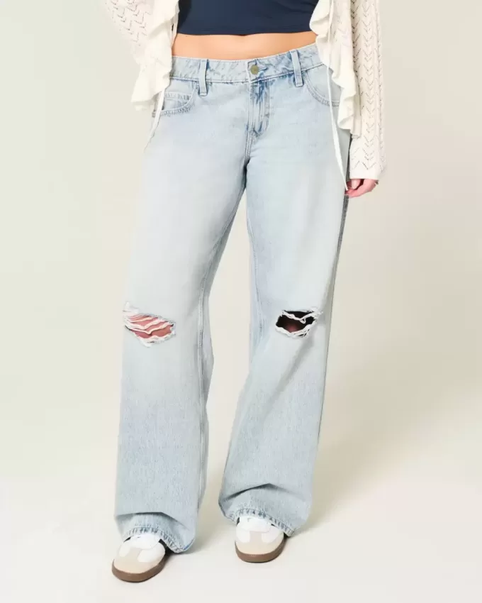 Jeans larghi a vita bassa con strappi e lavaggio chiaro
