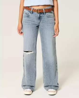 Jeans larghi a vita bassa con strappi e lavaggio chiaro