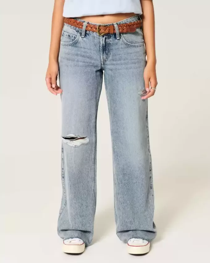 Jeans larghi a vita bassa con strappi e lavaggio chiaro