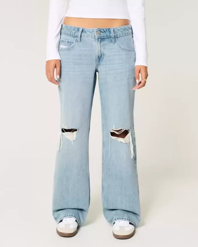 Jeans larghi a vita bassa con strappi e lavaggio chiaro