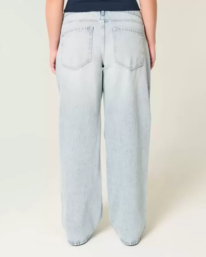 Jeans larghi a vita bassa con strappi e lavaggio chiaro