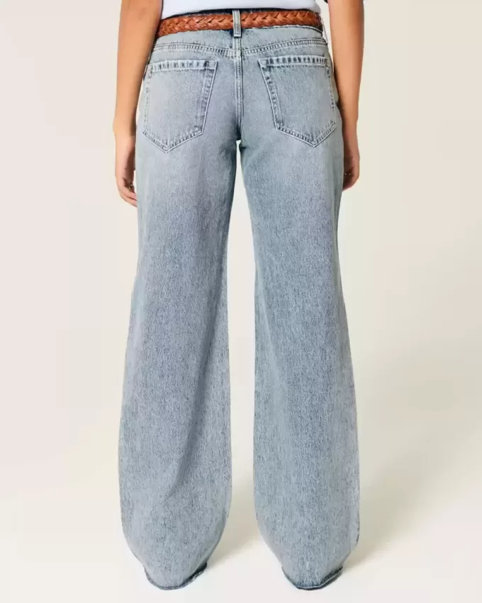 Jeans larghi a vita bassa con strappi e lavaggio chiaro