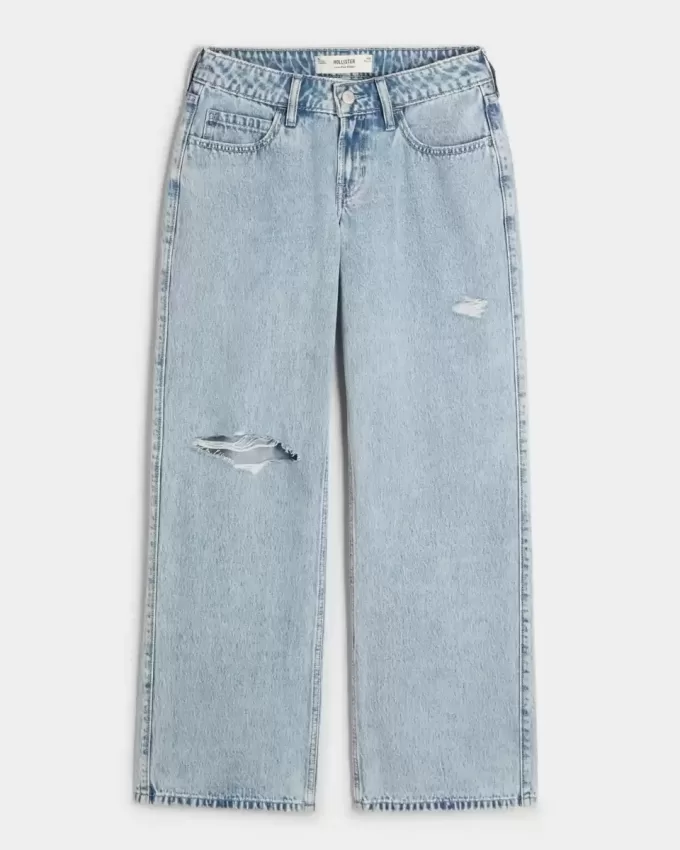 Jeans larghi a vita bassa con strappi e lavaggio chiaro