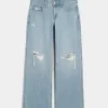 Jeans larghi a vita bassa con strappi e lavaggio chiaro