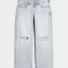 Jeans larghi a vita bassa con strappi e lavaggio chiaro