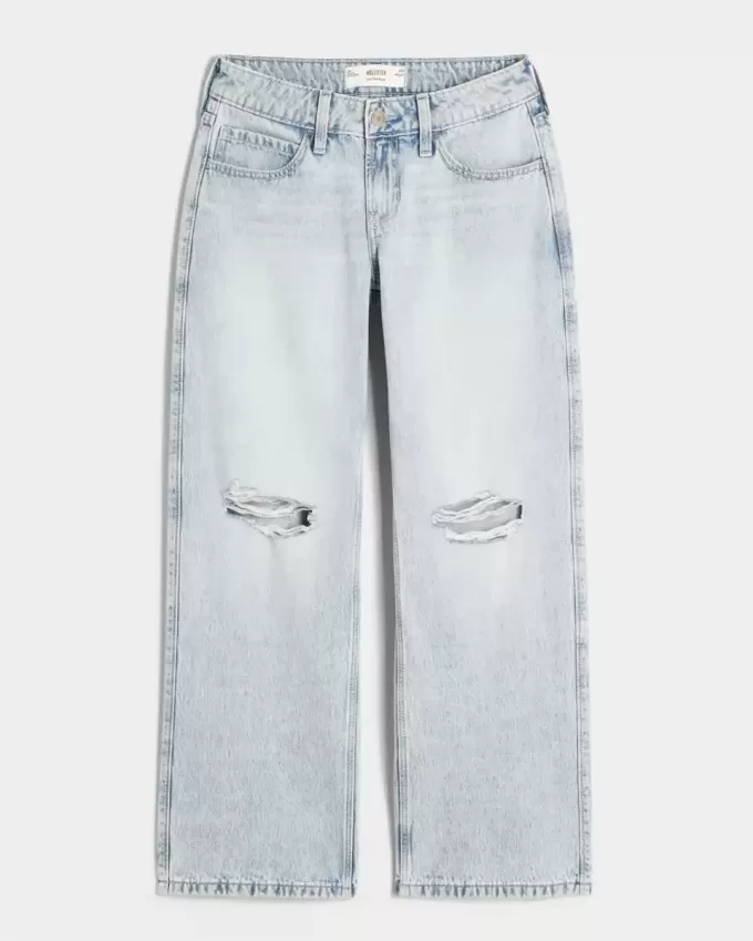 Jeans larghi a vita bassa con strappi e lavaggio chiaro