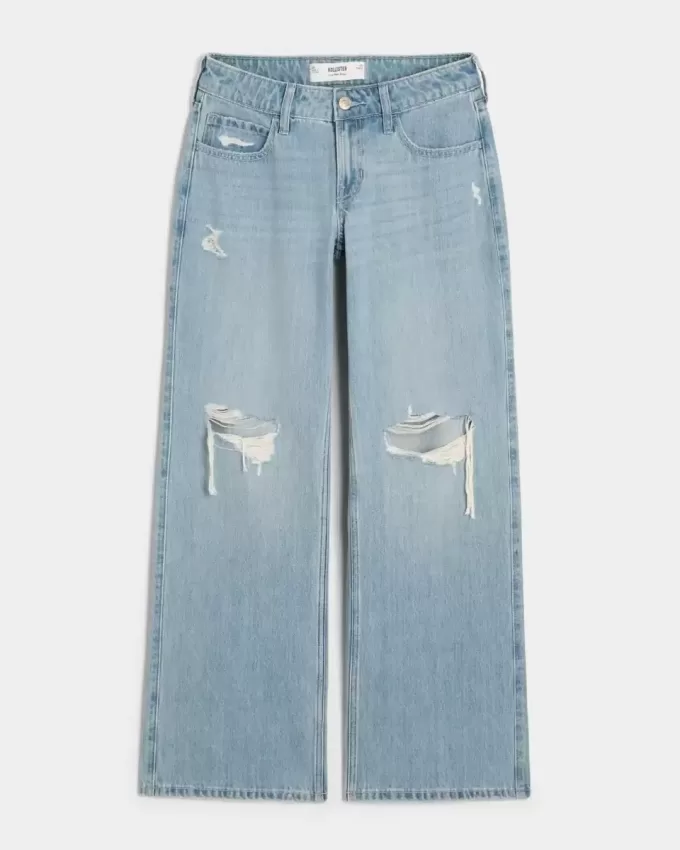 Jeans larghi a vita bassa con strappi e lavaggio chiaro