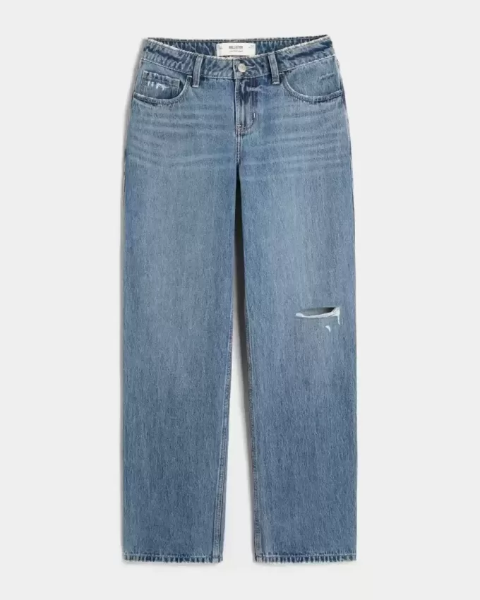 Jeans larghi a vita bassa con strappi e lavaggio medio