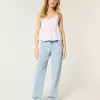 Jeans larghi a vita bassa e lavaggio chiaro