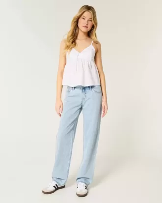 Jeans larghi a vita bassa e lavaggio chiaro