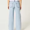 Jeans larghi a vita bassa e lavaggio chiaro