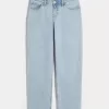 Jeans larghi a vita bassa e lavaggio chiaro
