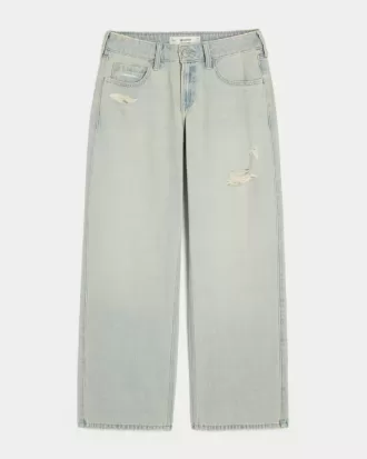 Jeans larghi a vita bassa e lavaggio chiaro effetto consumato