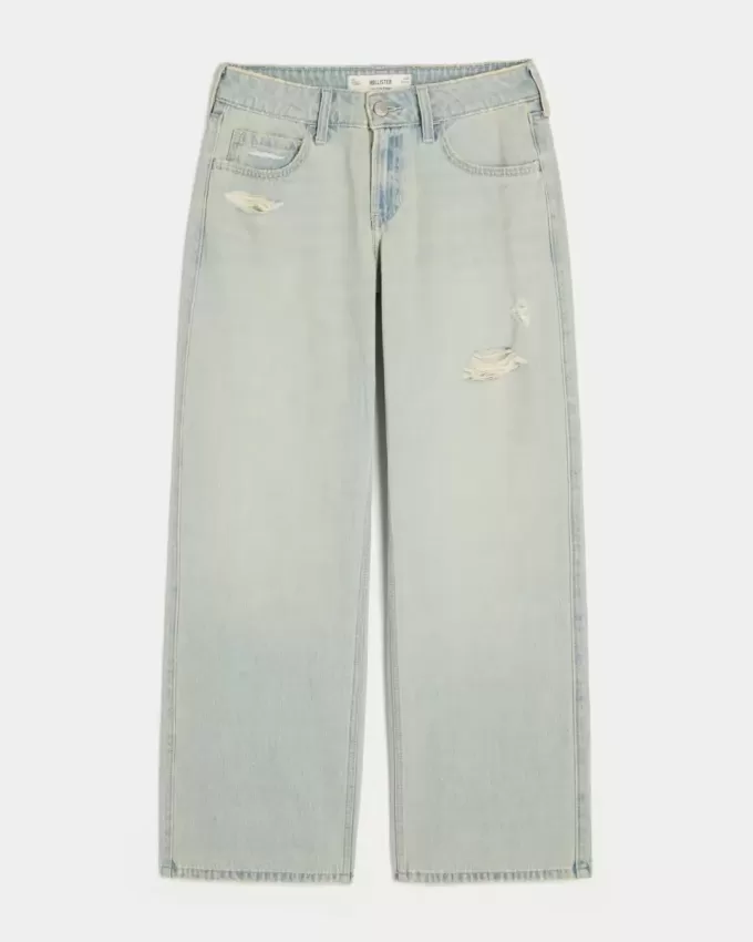 Jeans larghi a vita bassa e lavaggio chiaro effetto consumato