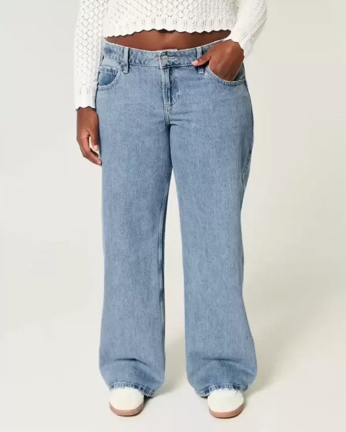 Jeans larghi a vita bassa e lavaggio medio con effetto curvy