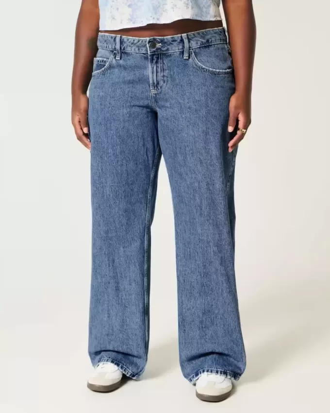 Jeans larghi a vita bassa e lavaggio medio con effetto curvy Jeans larghi a vita bassa e lavaggio medio con effetto curvy