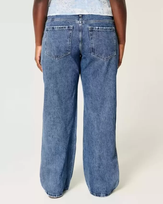Jeans larghi a vita bassa e lavaggio medio con effetto curvy Jeans larghi a vita bassa e lavaggio medio con effetto curvy