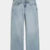 Jeans larghi a vita bassa e lavaggio medio con effetto curvy