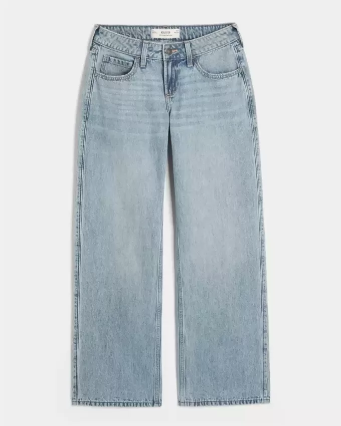 Jeans larghi a vita bassa e lavaggio medio con effetto curvy