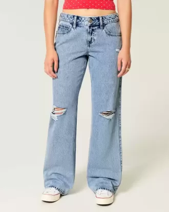 Jeans larghi a vita bassa e lavaggio medio con strappi curvy