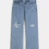 Jeans larghi a vita bassa e lavaggio medio con strappi curvy