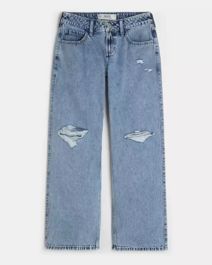 Jeans larghi a vita bassa e lavaggio medio con strappi curvy