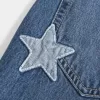 Jeans larghi a vita bassa e lavaggio scuro, modello Class of ’26, ricamati