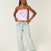 Jeans larghi a vita bassa e regolabile, lavaggio chiaro