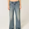 Jeans larghi a vita bassa e regolabile, lavaggio medio