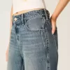 Jeans larghi a vita bassa e regolabile, lavaggio medio