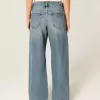 Jeans larghi a vita bassa e regolabile, lavaggio medio