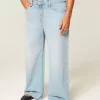 Jeans larghi a vita bassa effetto consumato