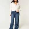 Jeans larghi a vita media e lavaggio scuro con effetto curvy